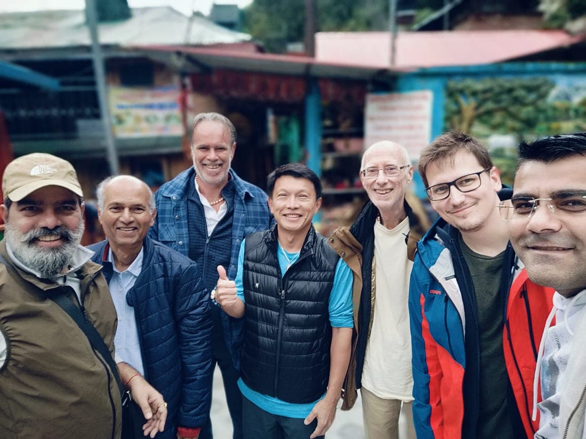 Rajiv Tomar with travellers in a Himalayan market town