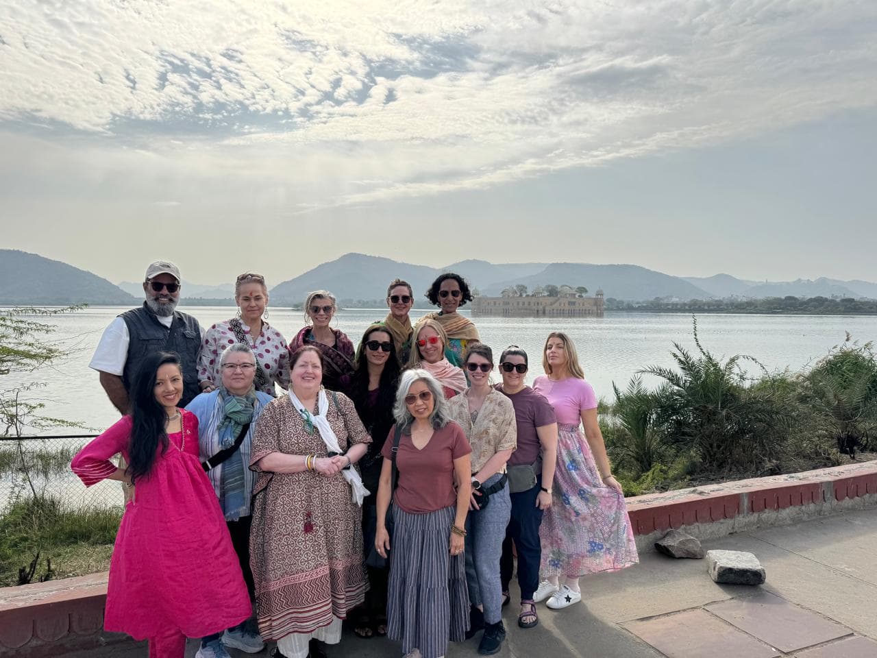 Guests beside the lake at the Jal Mahal, Jaipur