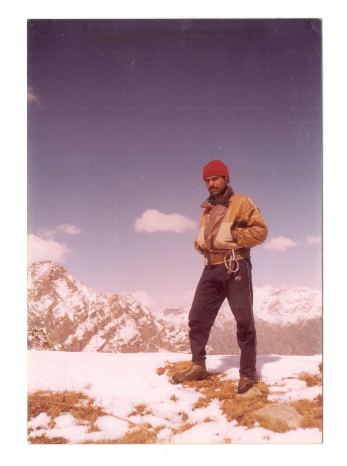 Rajiv Tomar on a snow-covered Himalayan ridge during his mountaineering years