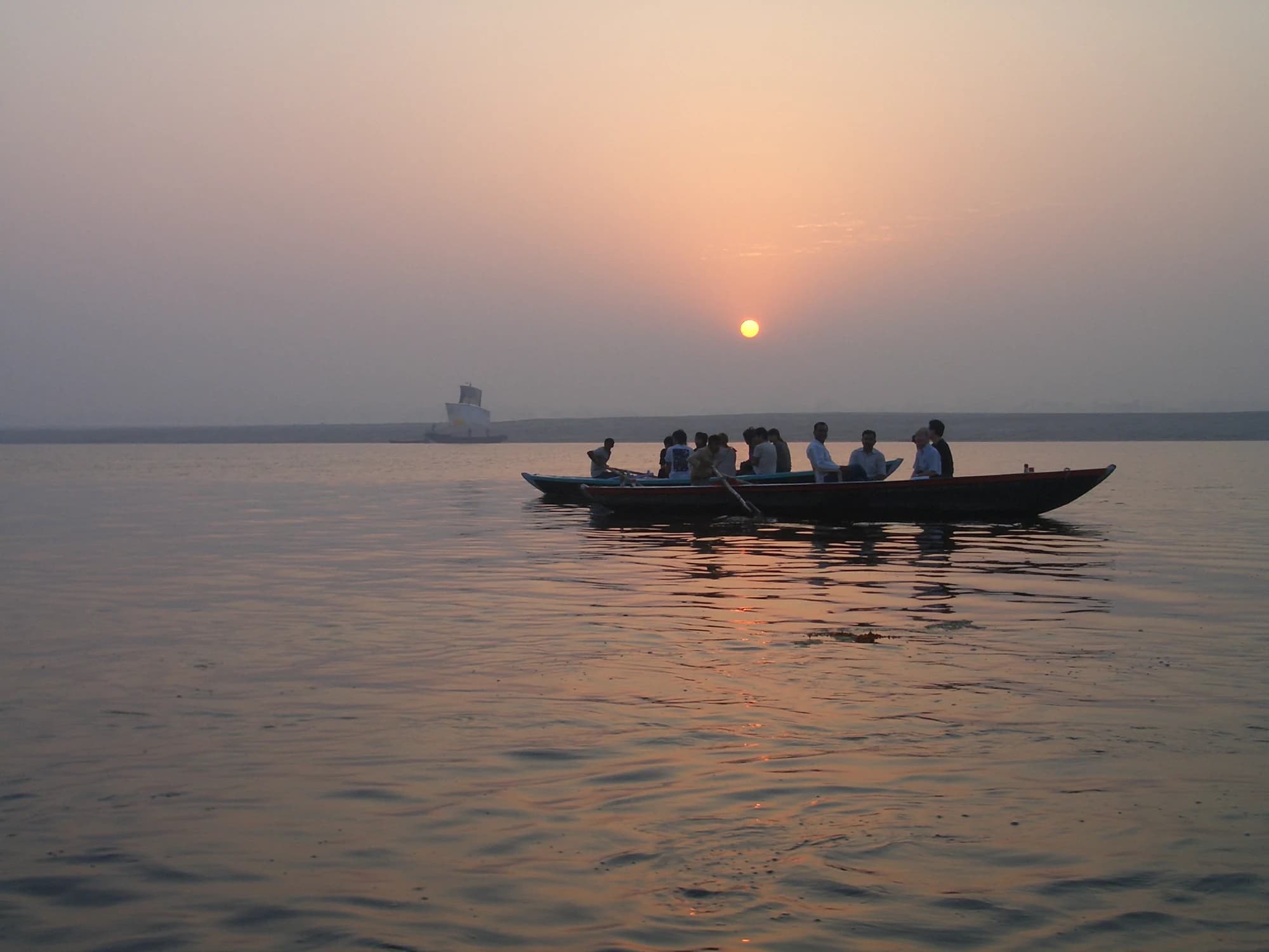A boat on the Ganga at sunrise