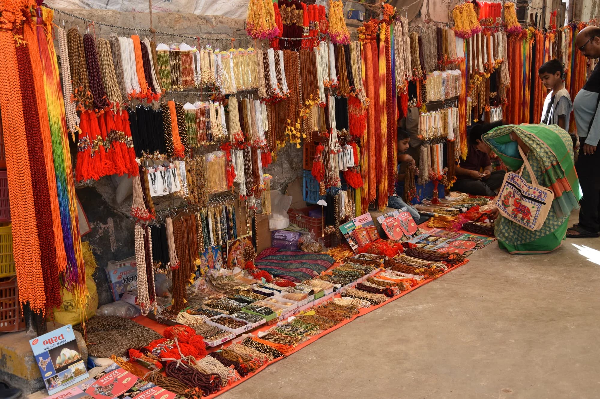 Prayer beads and sacred threads for sale at a temple bazaar
